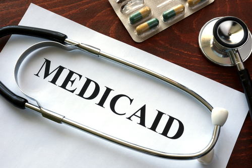 A paper with medicaid on it next to a stethoscope